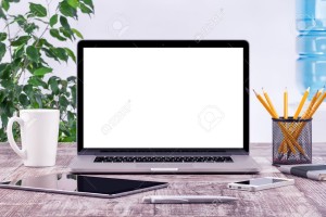 41302677-office-workplace-with-open-laptop-mockup-tablet-computer-and-smartphone-on-the-wooden-desk-for-desig-Stock-Photo